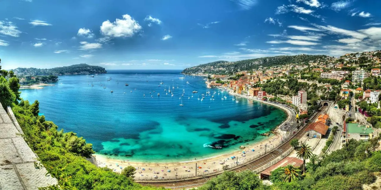 The Villefranche bay and hillside villas seen from high above on a sunny day