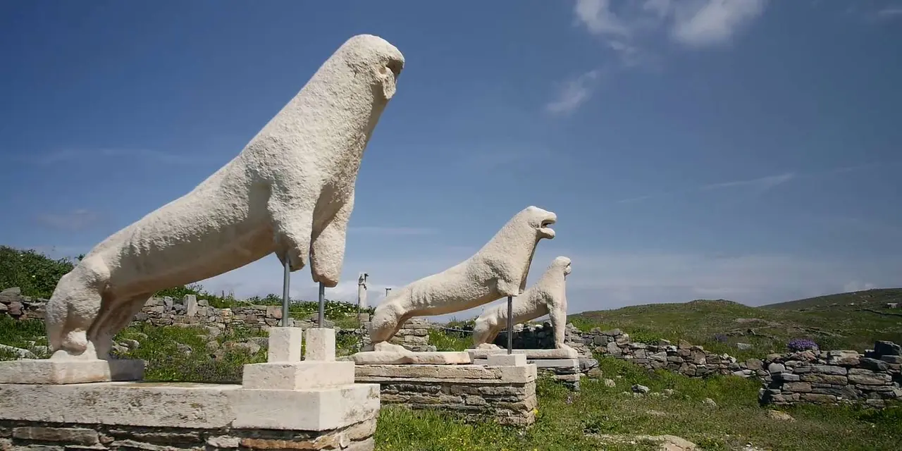 The marble lion statues on the Terrace of the Lions at Delos under a blue sky