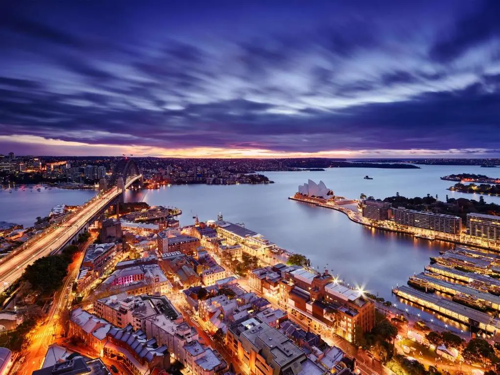 Dusk view from Shangri-La Sydney over The Rocks, Circular Quay and the Sydney Opera House, with the Harbour Bridge approach on the left