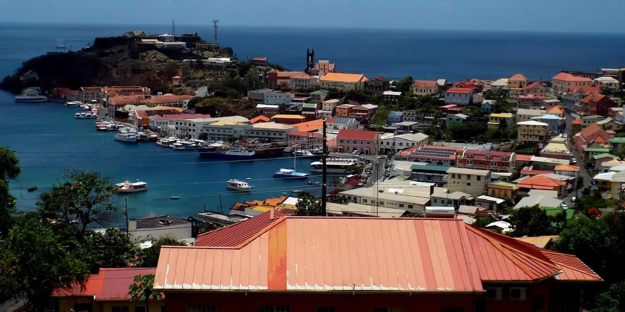 St. George's red roofs and harbor seen from a hilltop