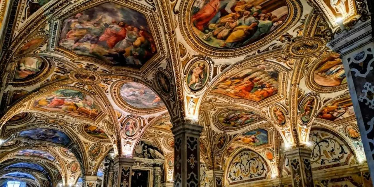 The gilded, fresco-covered vaults and arches of a church crypt