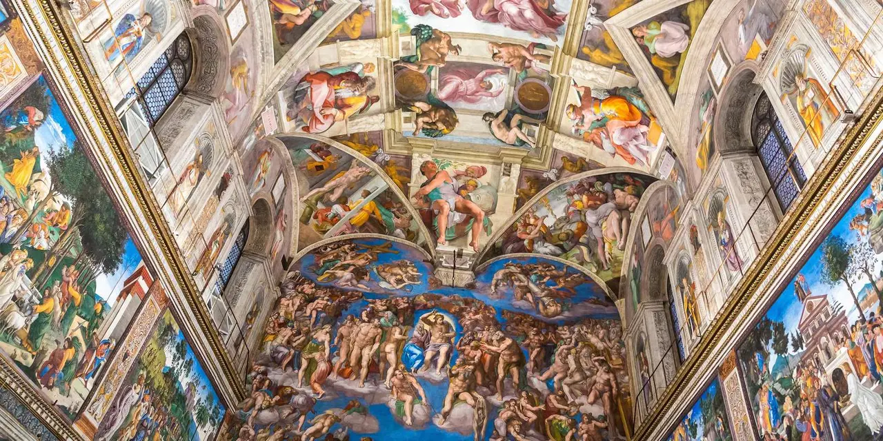 Looking up at the painted ceiling and Last Judgment wall of the Sistine Chapel